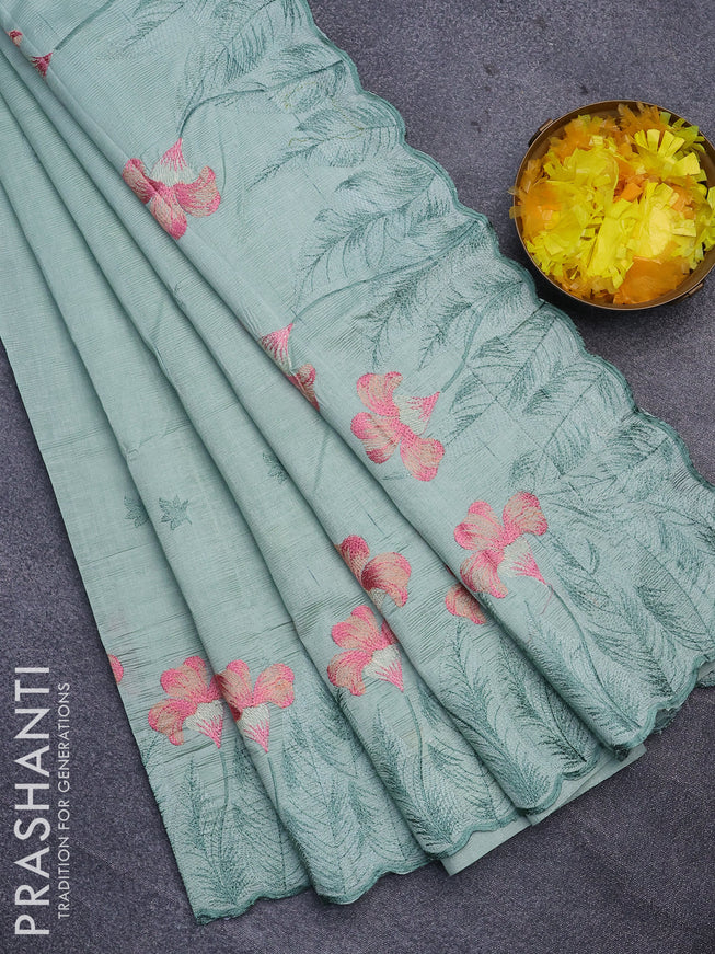 Semi raw silk saree pastel green with embroidery work buttas and floral design embroidery work border