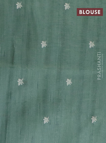 Semi raw silk saree pastel green shade with embroidery work buttas and floral design embroidery work border