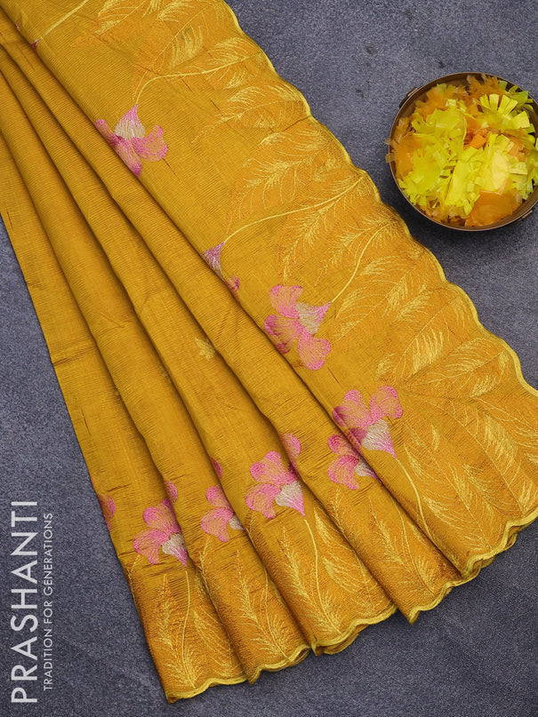 Semi raw silk saree mustard yellow with embroidery work buttas and floral design embroidery work border