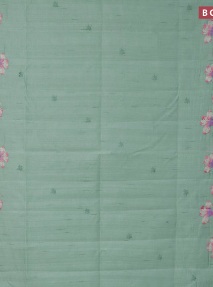 Semi raw silk saree pastel green with embroidery work buttas and floral design embroidery work border