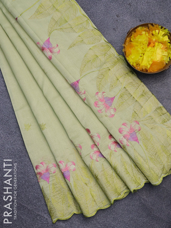 Semi raw silk saree mild pista green with embroidery work buttas and floral design embroidery work border