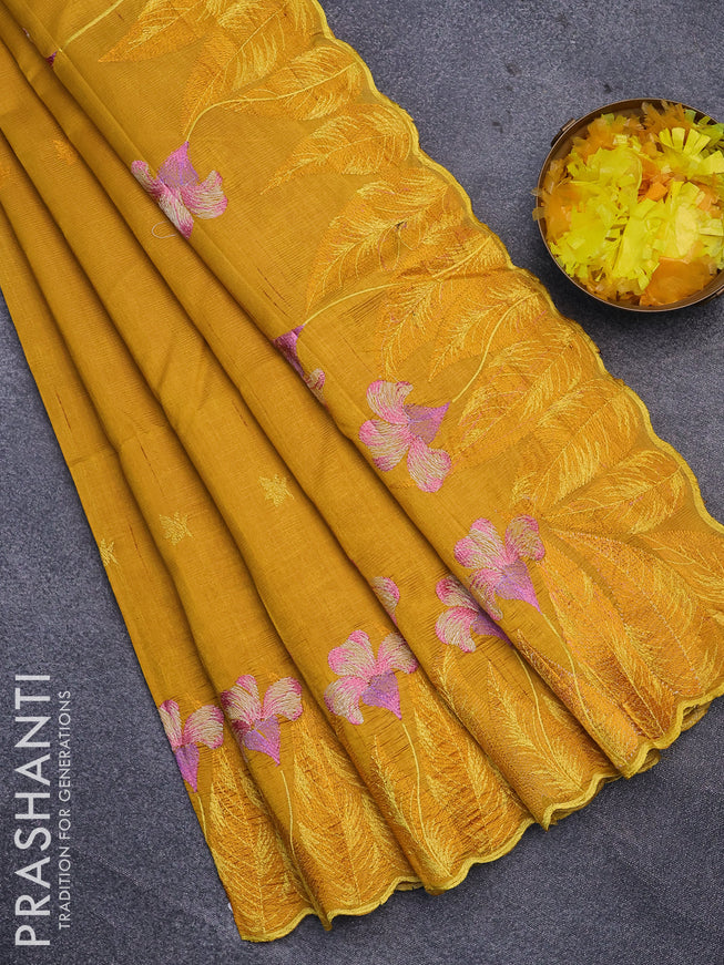 Semi raw silk saree mustard yellow with embroidery work buttas and floral design embroidery work border