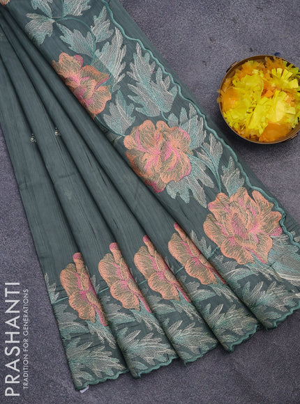 Semi raw silk saree pastel green shade with embroidery work buttas and floral design embroidery work border