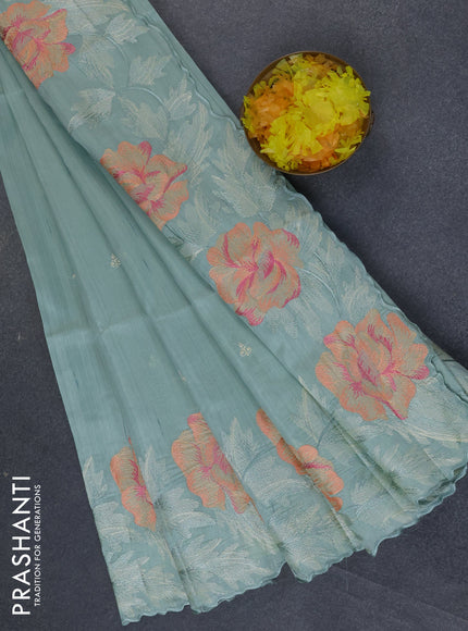 Semi raw silk saree pastel green shade with embroidery work buttas and floral design embroidery work border