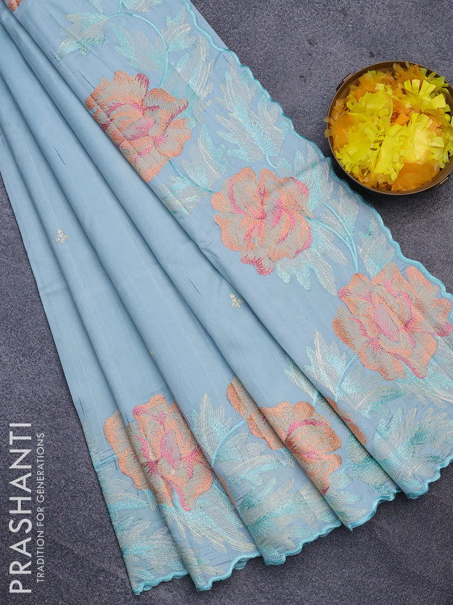 Semi raw silk saree teal blue shade with embroidery work buttas and floral design embroidery work border