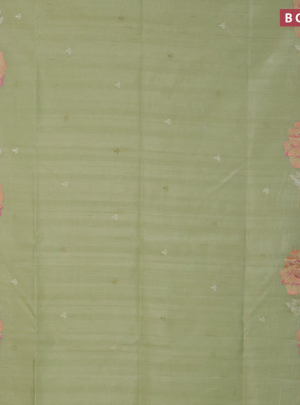 Semi raw silk saree mild pista green with embroidery work buttas and floral design embroidery work border