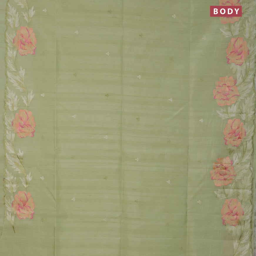 Semi raw silk saree mild pista green with embroidery work buttas and floral design embroidery work border