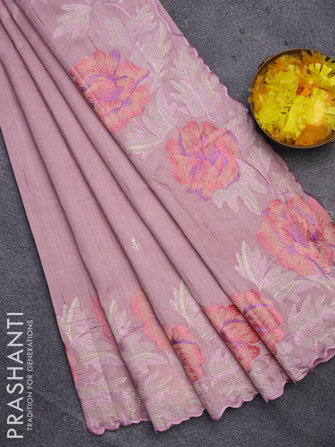 Semi raw silk saree pastel pink shade with embroidery work buttas and floral design embroidery work border