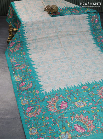 Semi tussar saree cream and teal green with zari woven buttas & prints and temple deisgn kalamkari printed mirror work border