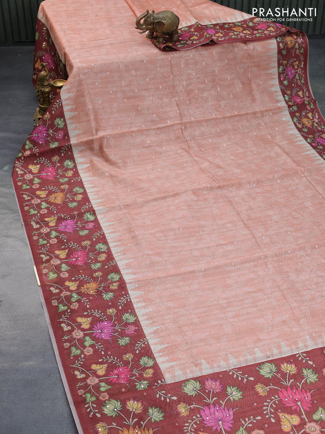 Semi tussar saree peach orange and rust shade with zari woven buttas & prints and temple deisgn kalamkari printed mirror work border