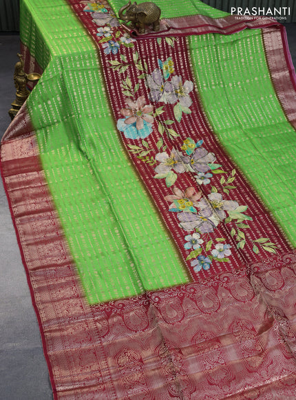 Semi raw silk saree dark pink and light green with allover zari weaves & floral digital prints and zari woven border