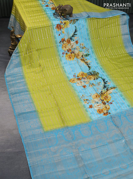 Semi raw silk saree light blue and lime green with allover zari weaves & floral digital prints and zari woven border