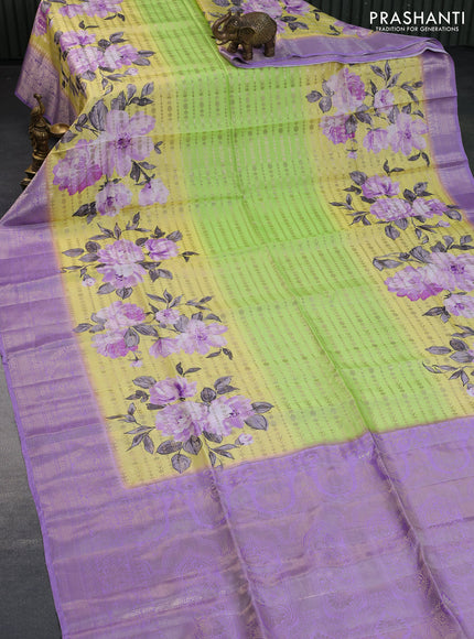 Semi raw silk saree fluorescent green and lavender with allover zari weaves & floral digital prints and zari woven border