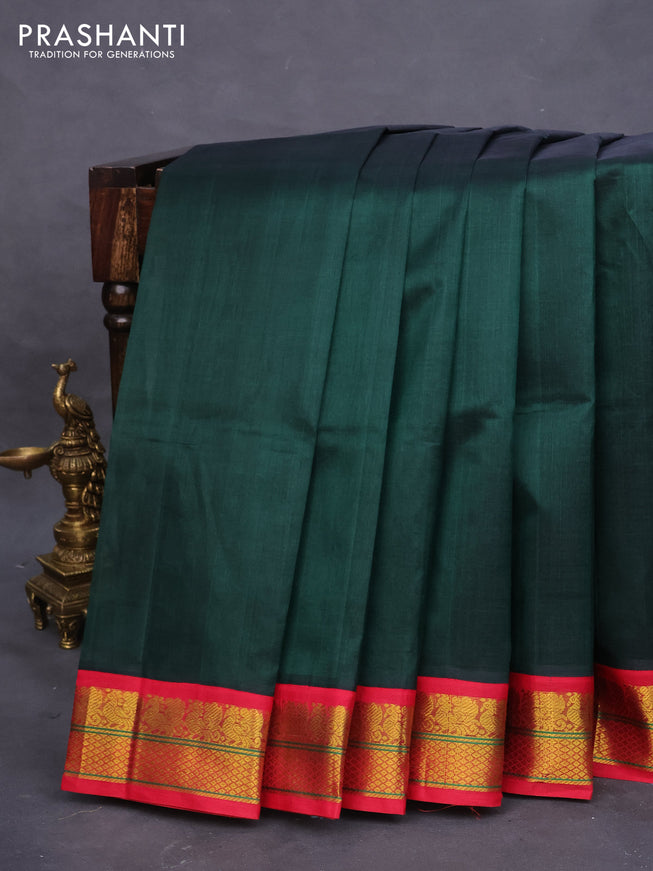 Silk cotton saree dark green and dark pink with plain body and zari woven korvai border