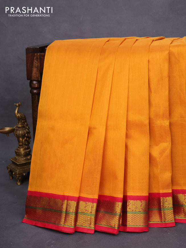 Silk cotton saree mango yellow and pink with plain body and zari woven korvai border