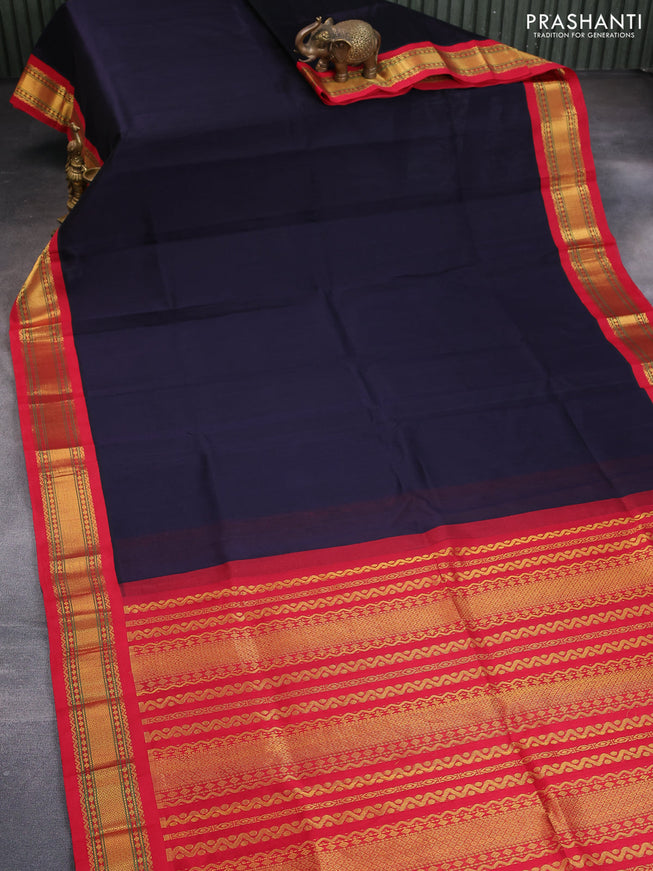 Silk cotton saree navy blue and red with plain body and zari woven korvai border