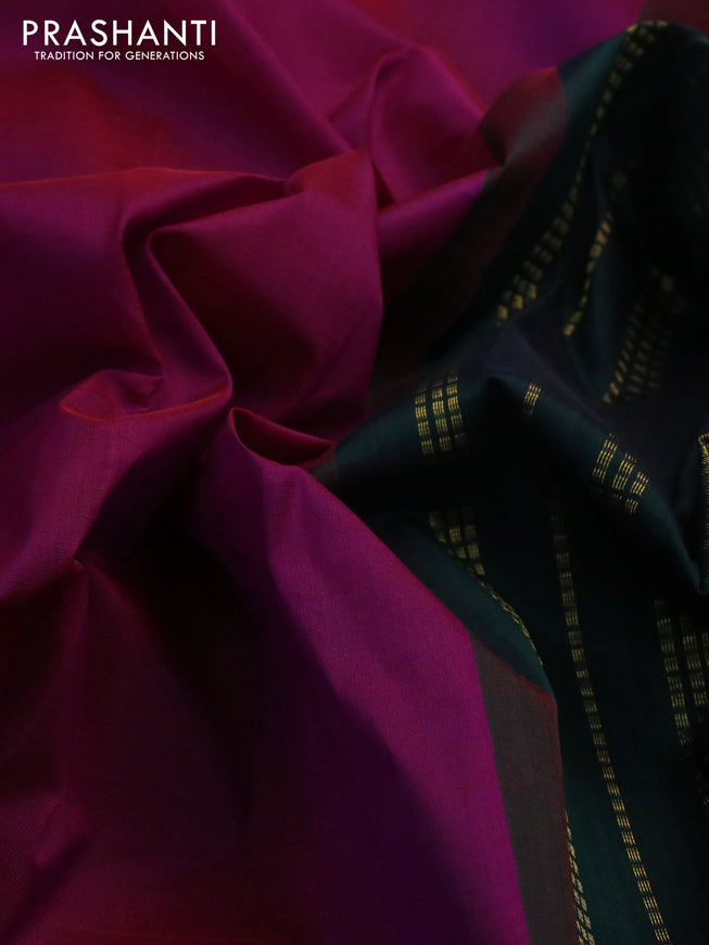 Silk cotton saree purple and dark green with plain body and zari woven korvai border