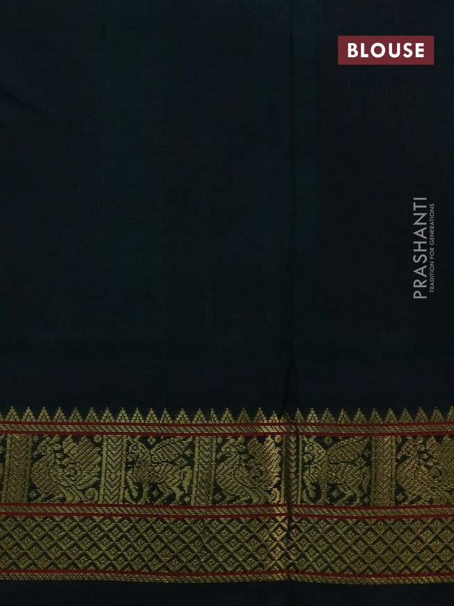 Silk cotton saree purple and dark green with plain body and zari woven korvai border