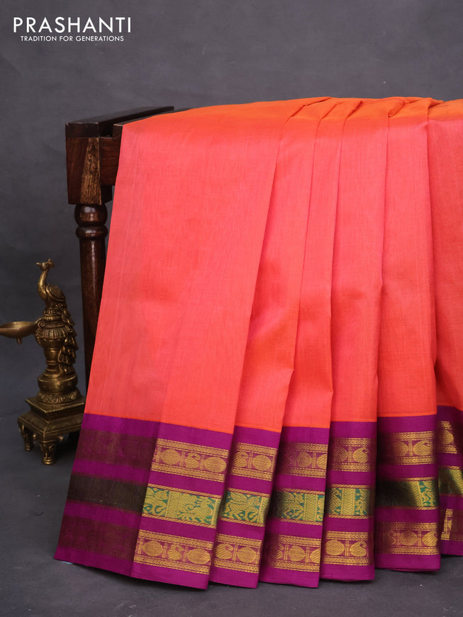 Silk cotton saree peach orange and purple with plain body and long zari woven korvai border