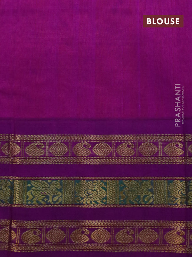 Silk cotton saree peach orange and purple with plain body and long zari woven korvai border