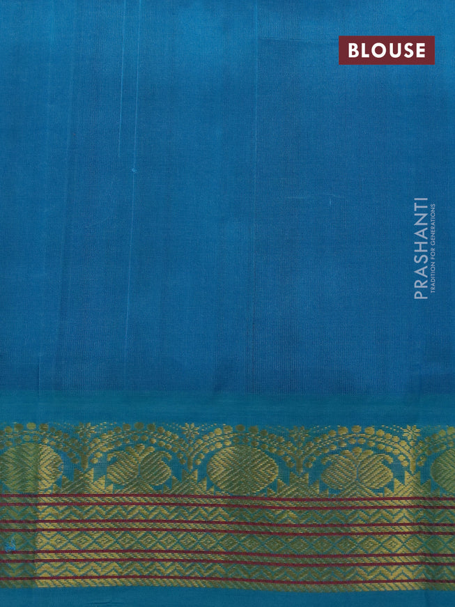 Silk cotton saree maroon and light blue with plain body and zari woven korvai border