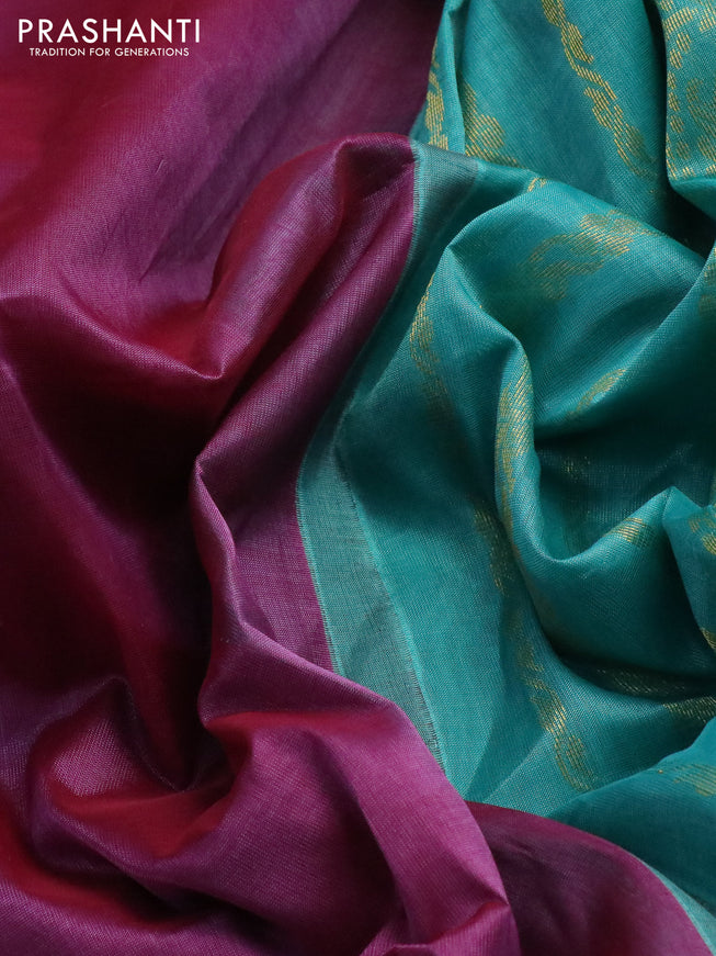 Silk cotton saree purple shade and teal blue with plain body and zari woven korvai border