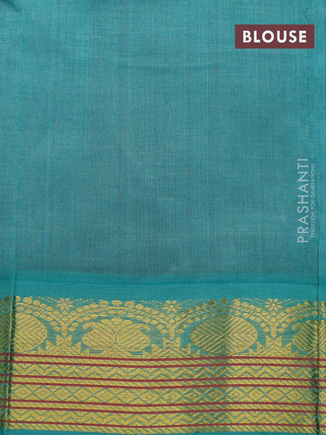 Silk cotton saree purple shade and teal blue with plain body and zari woven korvai border