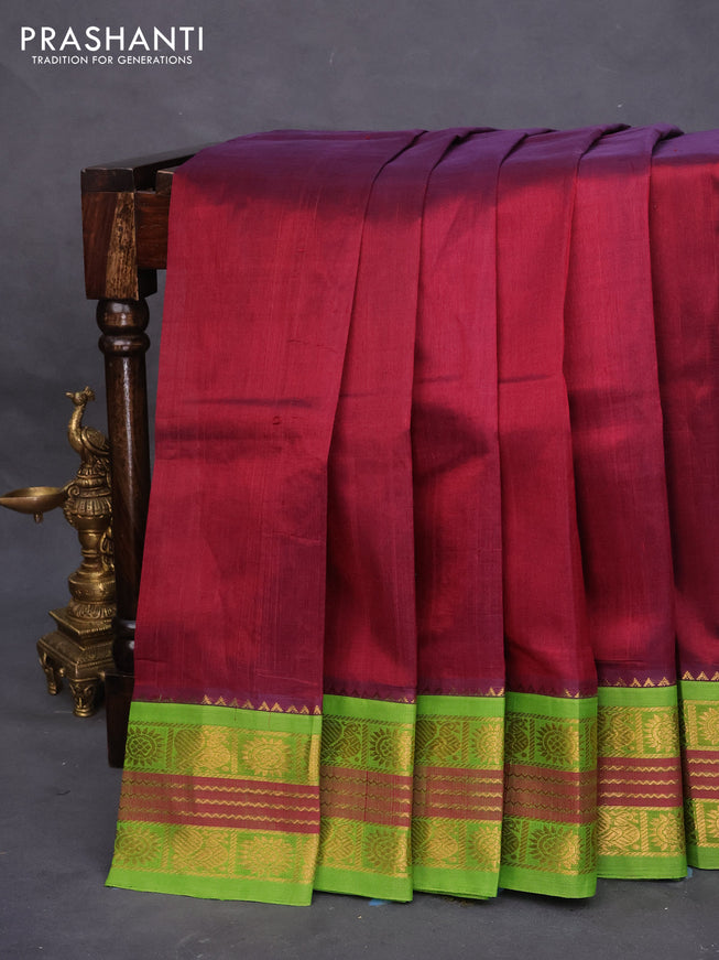 Silk cotton saree maroon and light green with plain body and zari woven korvai border