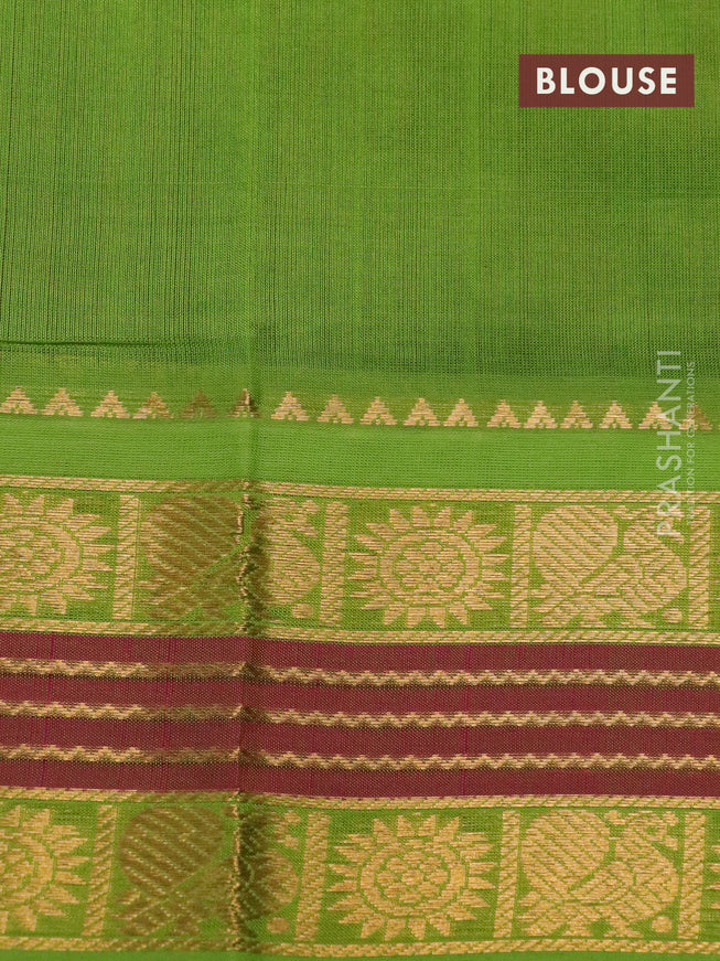 Silk cotton saree maroon and light green with plain body and zari woven korvai border