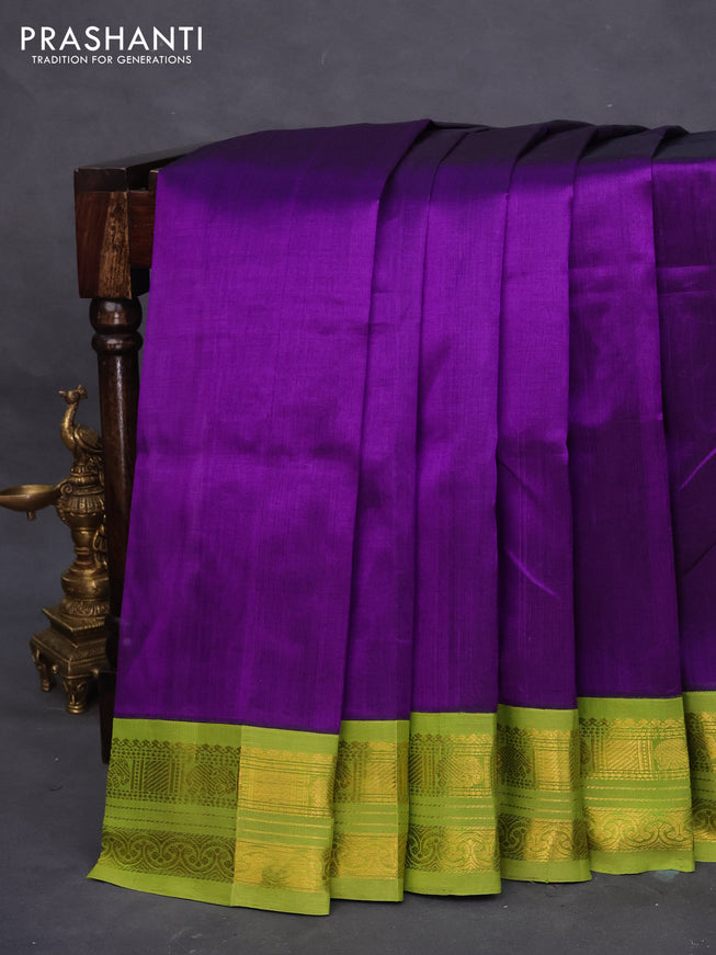 Silk cotton saree violet and light green with plain body and zari woven korvai border