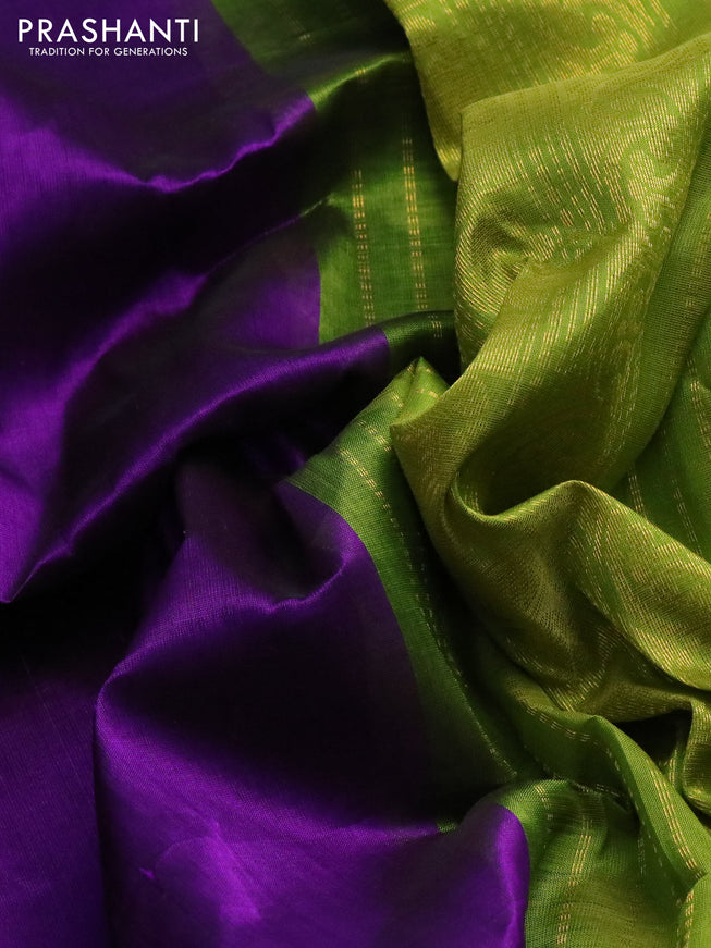 Silk cotton saree violet and light green with plain body and zari woven korvai border