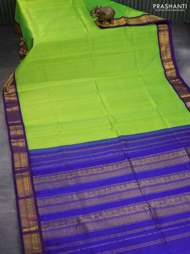 Silk cotton saree light green and blue with plain body and zari woven korvai border