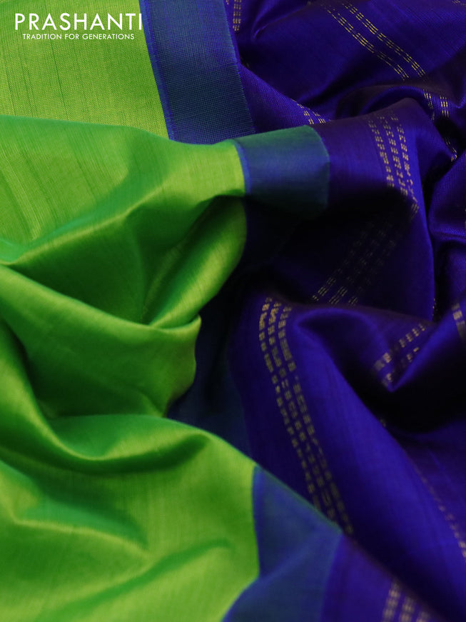 Silk cotton saree light green and blue with plain body and zari woven korvai border