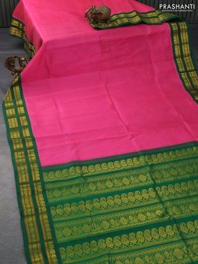 Silk cotton saree pink and green with plain body and zari woven korvai border