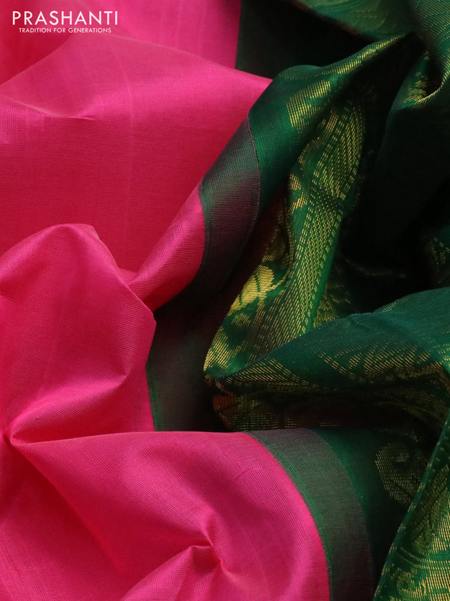 Silk cotton saree pink and green with plain body and zari woven korvai border