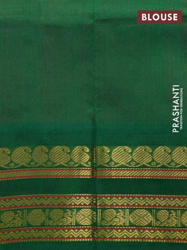 Silk cotton saree pink and green with plain body and zari woven korvai border