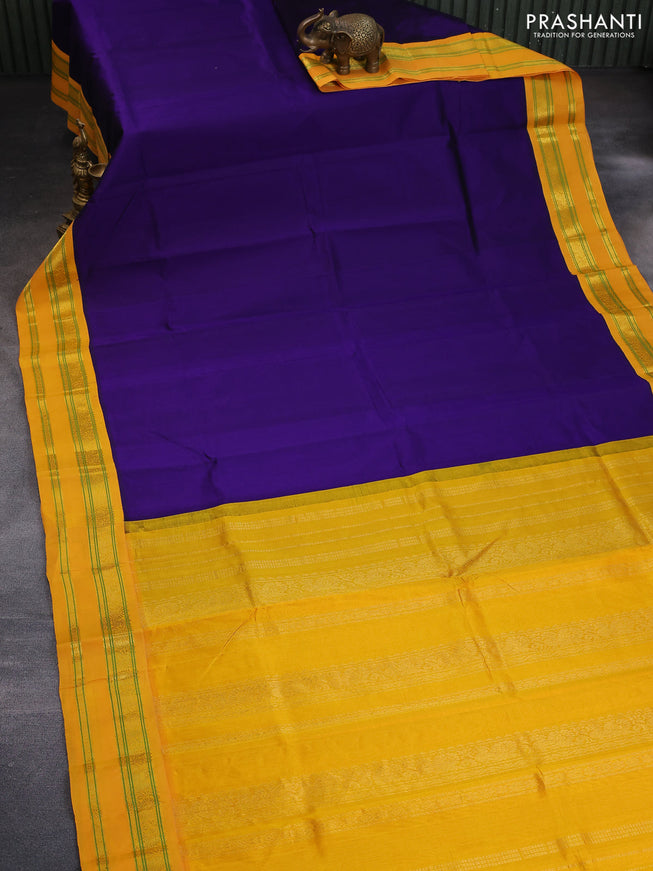 Silk cotton saree blue and mango yellow with plain body and rettapet zari woven korvai border