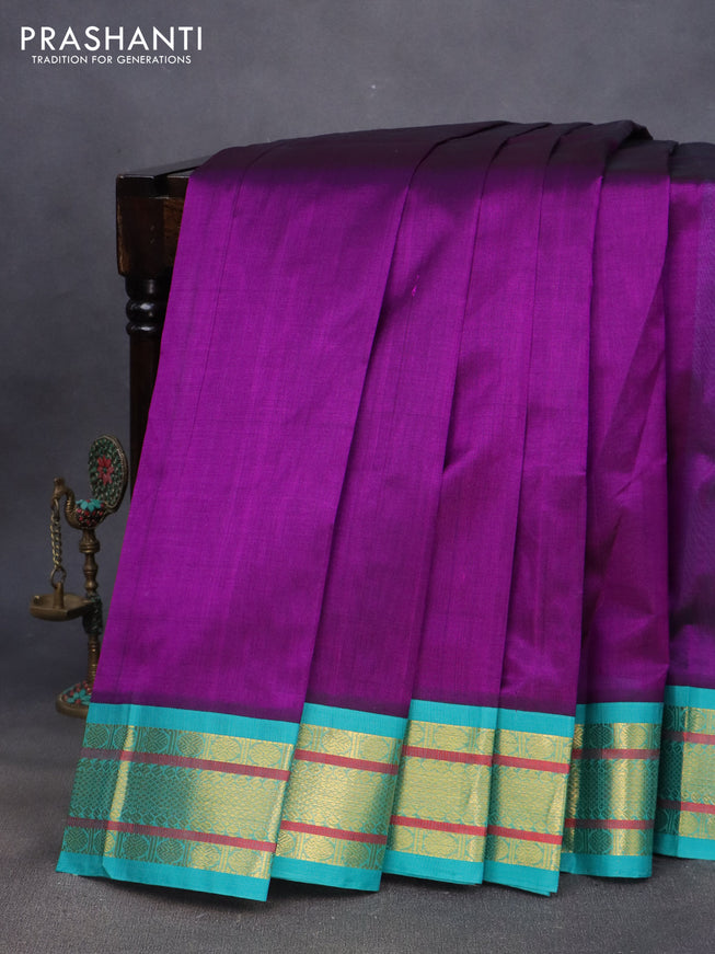 Silk cotton saree purple and teal blue with plain body and zari woven korvai border