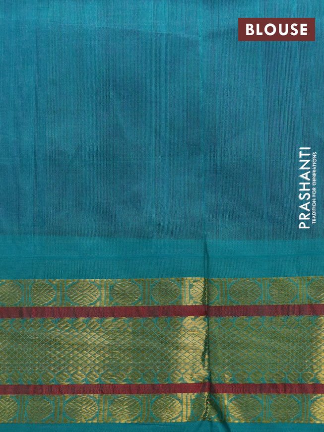 Silk cotton saree purple and teal blue with plain body and zari woven korvai border