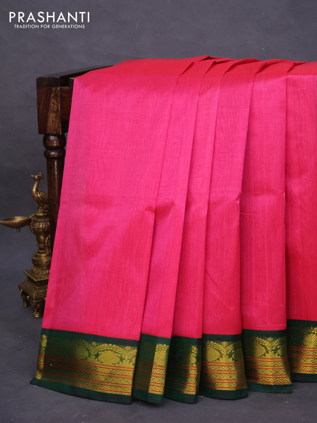 Silk cotton saree pink and green with plain body and zari woven korvai border