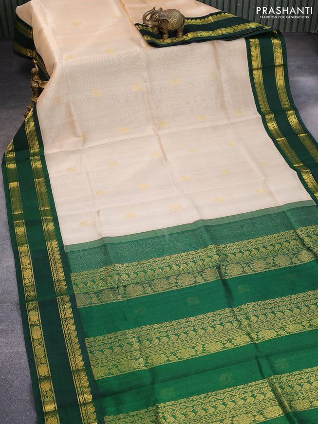 Silk cotton saree cream and green with annam zari woven buttas and rettapet zari woven korvai border