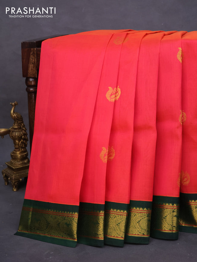 Silk cotton saree dual shade of pinkish orange and green with annam zari woven buttas and annam zari woven korvai border