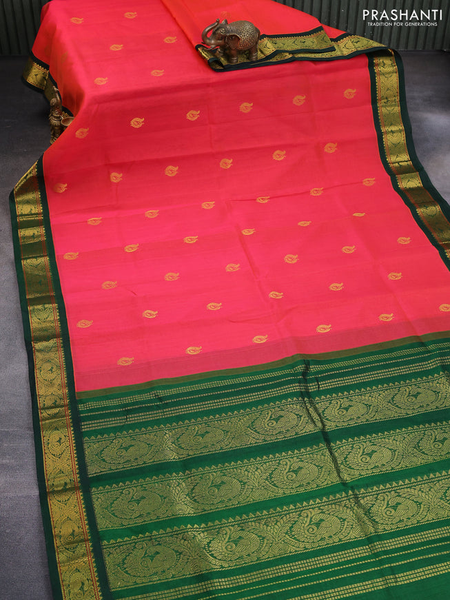 Silk cotton saree dual shade of pinkish orange and green with annam zari woven buttas and annam zari woven korvai border