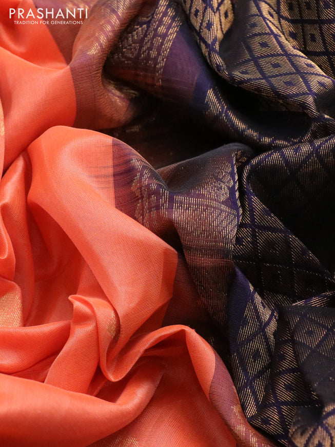 Silk cotton saree peach orange and navy blue with elephant zari woven buttas and long zari woven korvai border