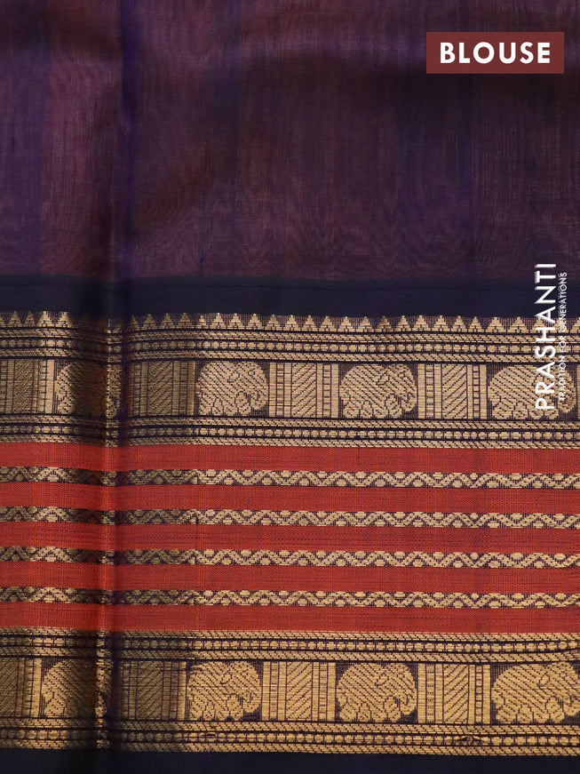 Silk cotton saree peach orange and navy blue with elephant zari woven buttas and long zari woven korvai border