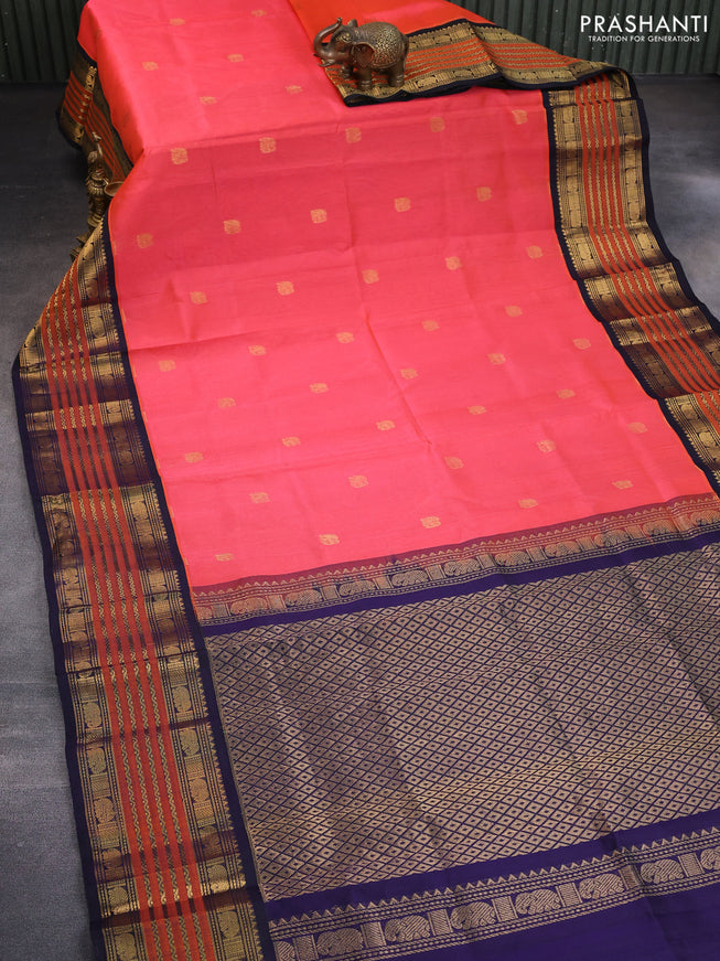 Silk cotton saree peach orange and dark blue with elephant zari woven buttas and long zari woven korvai border