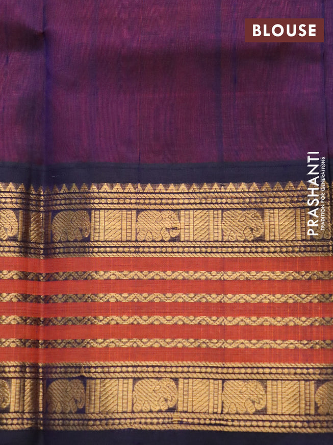 Silk cotton saree peach orange and dark blue with elephant zari woven buttas and long zari woven korvai border