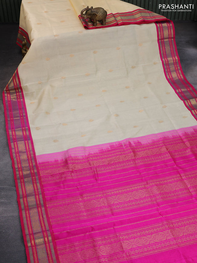 Silk cotton saree cream and pink with zari woven buttas and zari woven korvai border