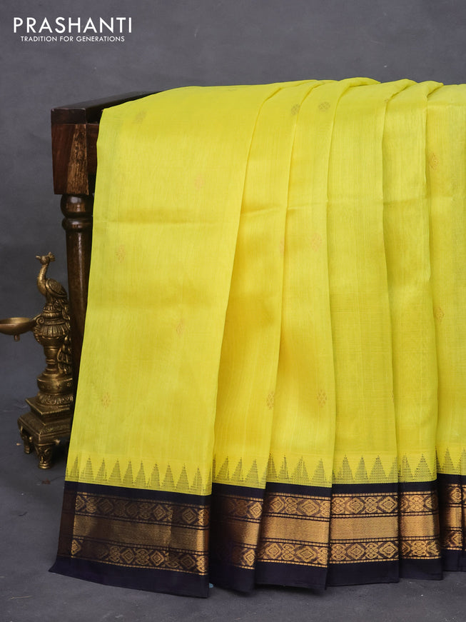 Silk cotton saree lime yellow and navy blue with zari woven buttas and zari woven korvai border