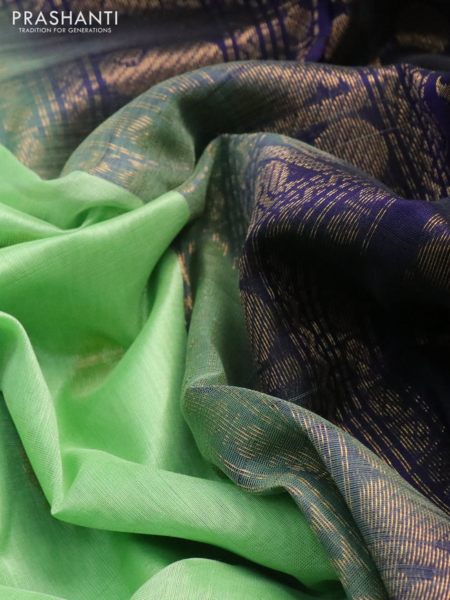 Silk cotton saree pista green and navy blue with zari woven buttas and zari woven korvai border